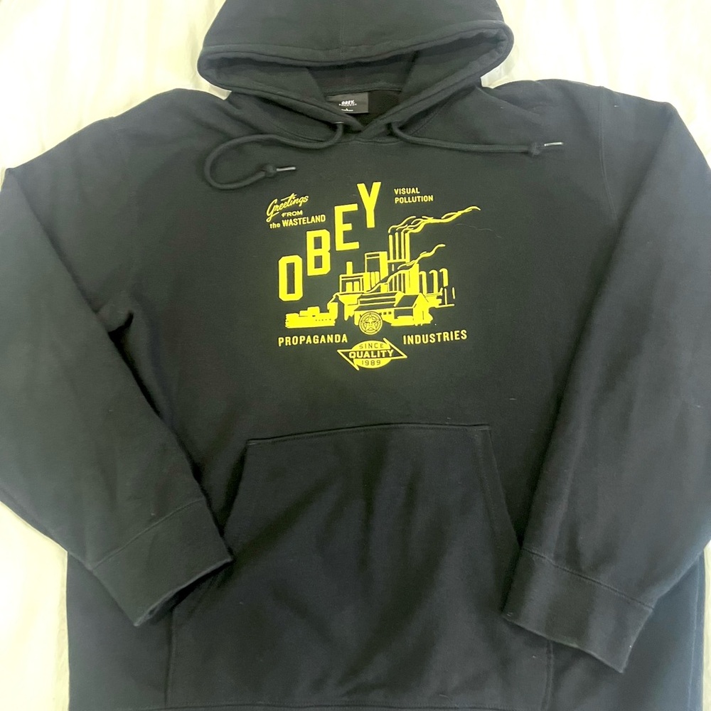 Obey Black Hoodie with Vibrant Yellow Graphic